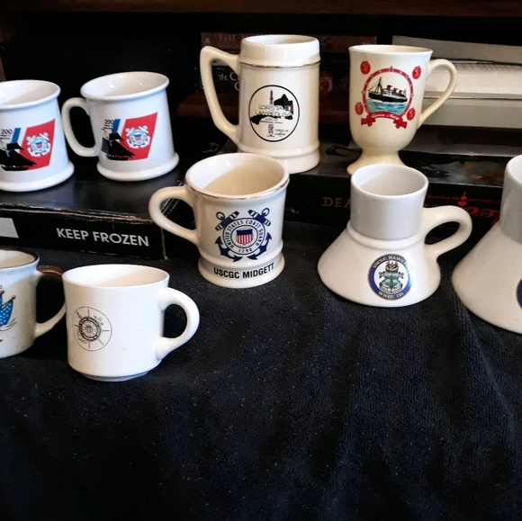 Vintage coast guard related mugs